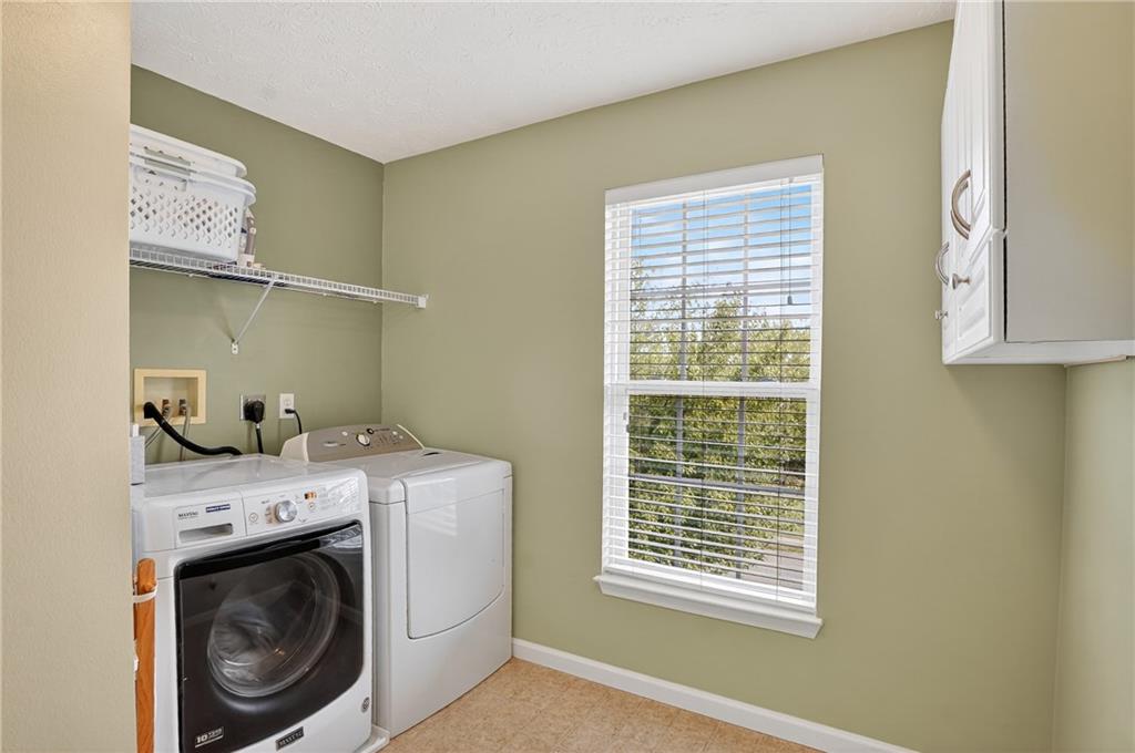 224 Field Club Circle McKees Rocks, PA 15136 - Photo 28 of 41 a utility room with dryer and washer