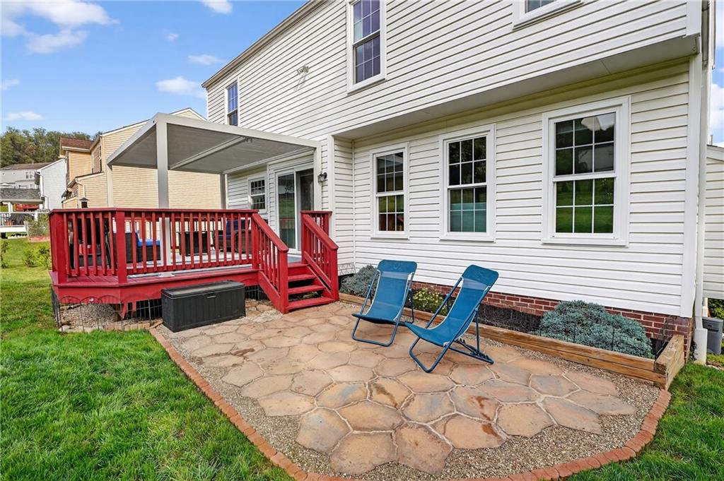 224 Field Club Circle McKees Rocks, PA 15136 - Photo 31 of 41 a view of a house with wooden deck and furniture