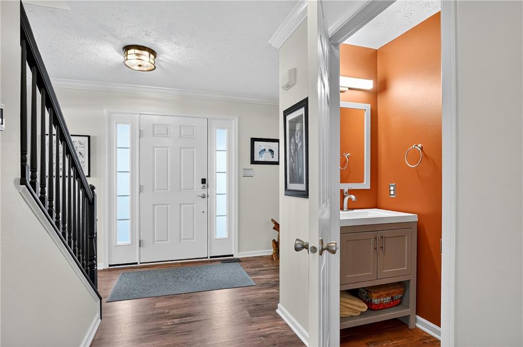 224 Field Club Circle McKees Rocks, PA 15136 - Photo 4 of 41 a view of an entryway with wooden floor and door