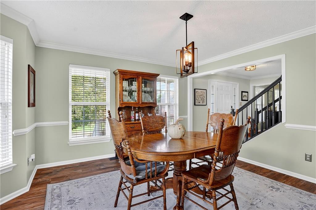 224 Field Club Circle McKees Rocks, PA 15136 - Photo 9 of 41 a dining room with furniture window and wooden floor