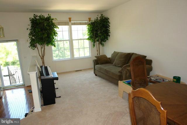 43191 Riders Square Broadlands, VA 20148 - Photo 12 of 21 a living room with furniture and a window