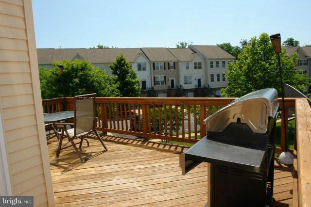 43191 Riders Square Broadlands, VA 20148 - Photo 20 of 21 a view of a chairs and table on the terrace