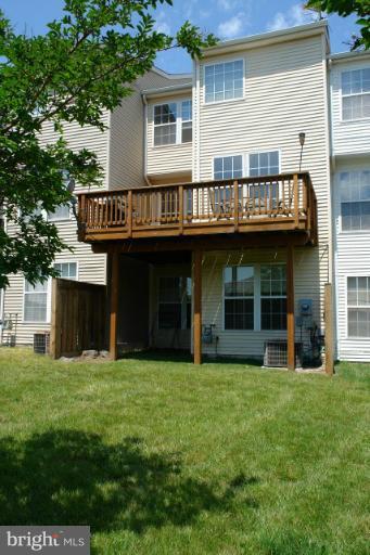 43191 Riders Square Broadlands, VA 20148 - Photo 4 of 21 a view of a house with a yard and sitting area