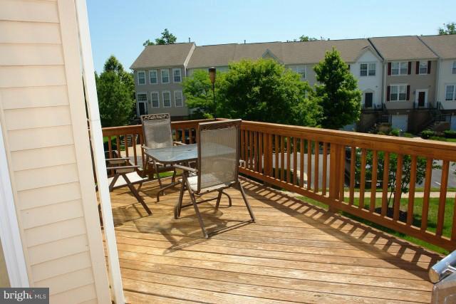 43191 Riders Square Broadlands, VA 20148 - Photo 10 of 21 a view of balcony with chairs