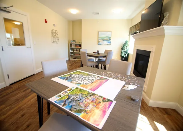a living room with furniture and a table