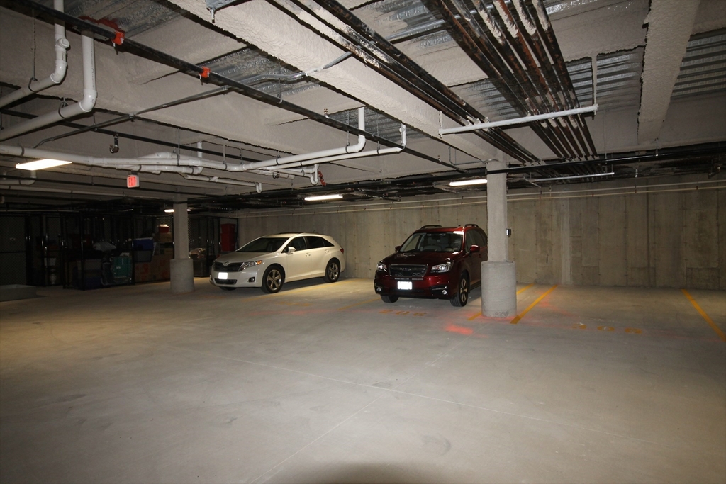 2 Regency Village Way, Unit 208 Merrimac, MA 01860 - Photo 8 of 19 a view of car parking
