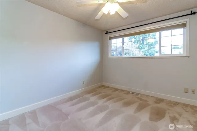 a utility room with sink dryer and washer