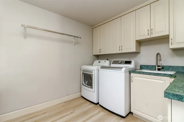 a view of a hallway with entryway and hall