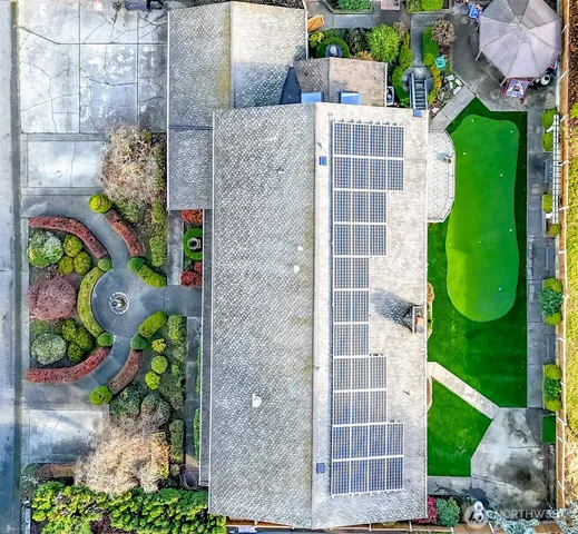 a view of a street with sitting area