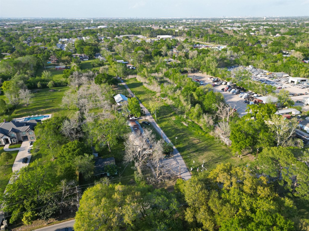 721 Crenshaw Road Houston, TX 77504 - Photo 5 of 7 an aerial view of residential houses with outdoor space and trees