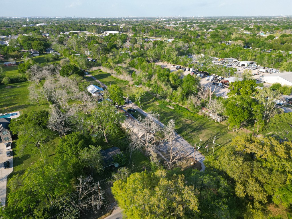 721 Crenshaw Road Houston, TX 77504 - Photo 6 of 7 an aerial view of residential houses with outdoor space and trees