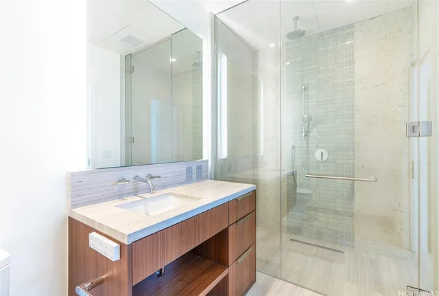 a bathroom with a sink and a mirror