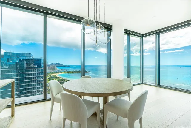 a view of a dining room with furniture window and outside view