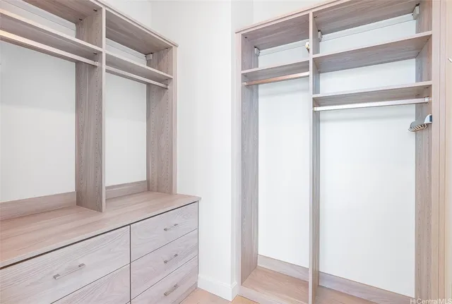 a bathroom with a shower and a mirror