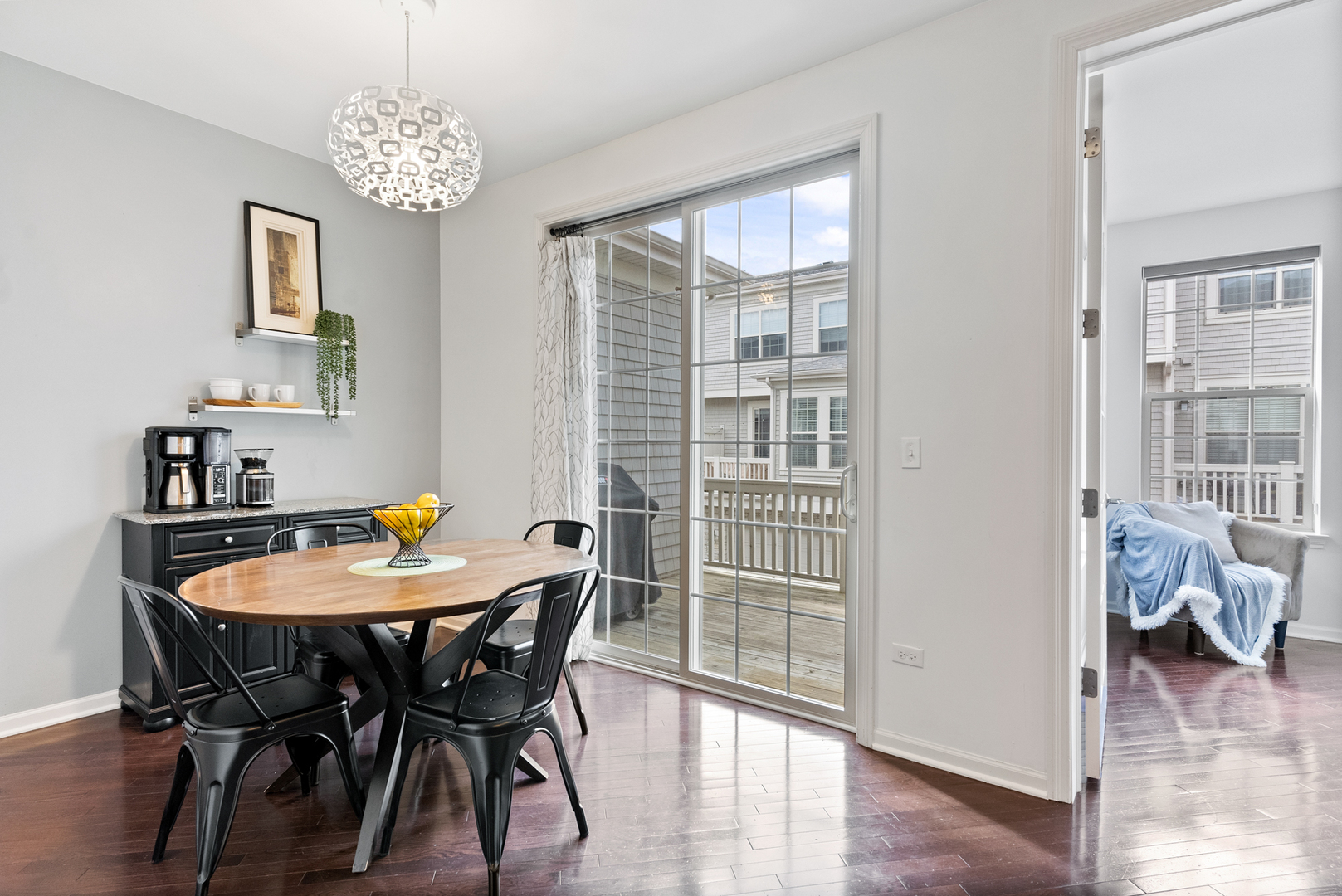 303 South NW Highway, Unit 2 Park Ridge, IL 60068 - Photo 12 of 30 a view of a dining room with furniture window and wooden floor