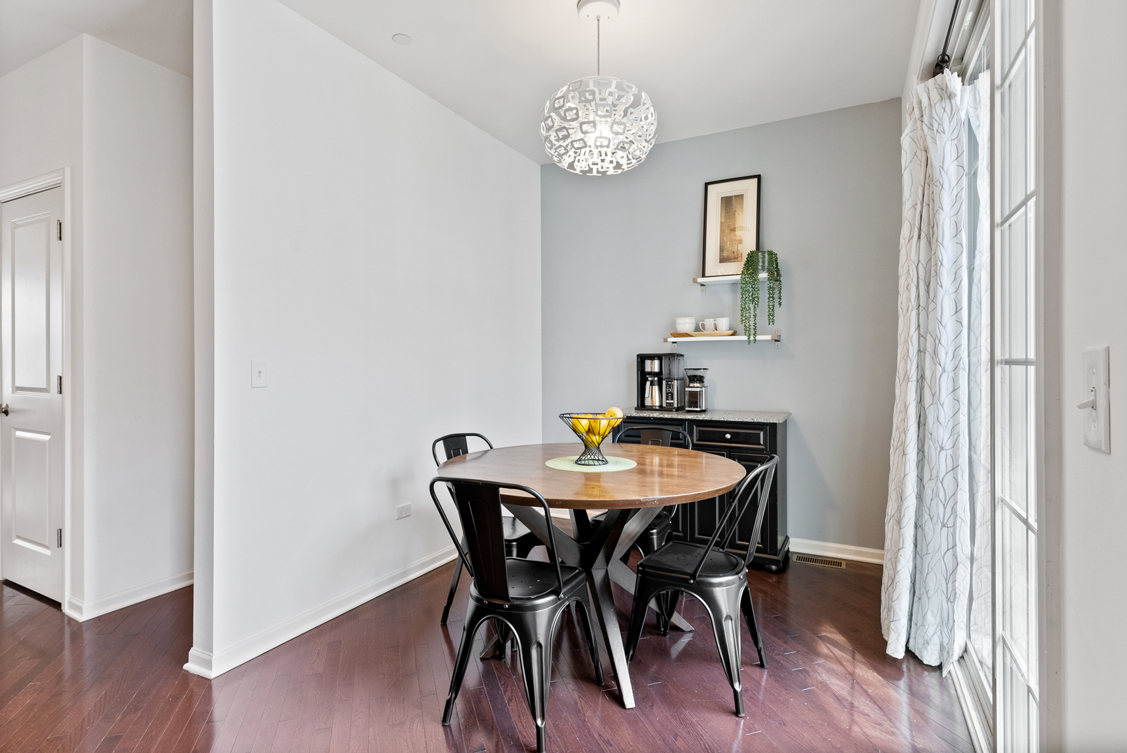 303 South NW Highway, Unit 2 Park Ridge, IL 60068 - Photo 13 of 30 a view of a dining room with furniture and wooden floor