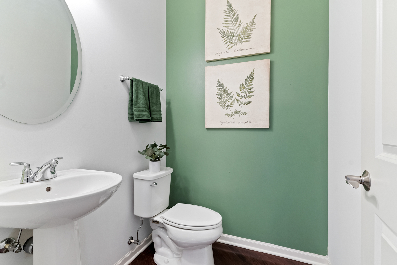 303 South NW Highway, Unit 2 Park Ridge, IL 60068 - Photo 15 of 30 a bathroom with a toilet sink and mirror