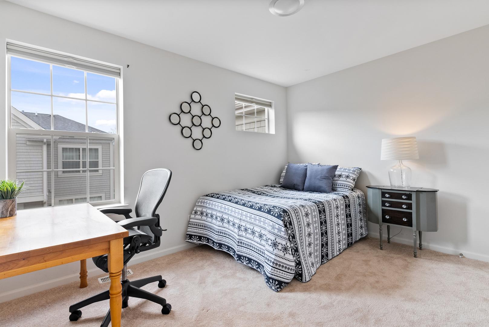 303 South NW Highway, Unit 2 Park Ridge, IL 60068 - Photo 19 of 30 a bedroom with a bed and a desk
