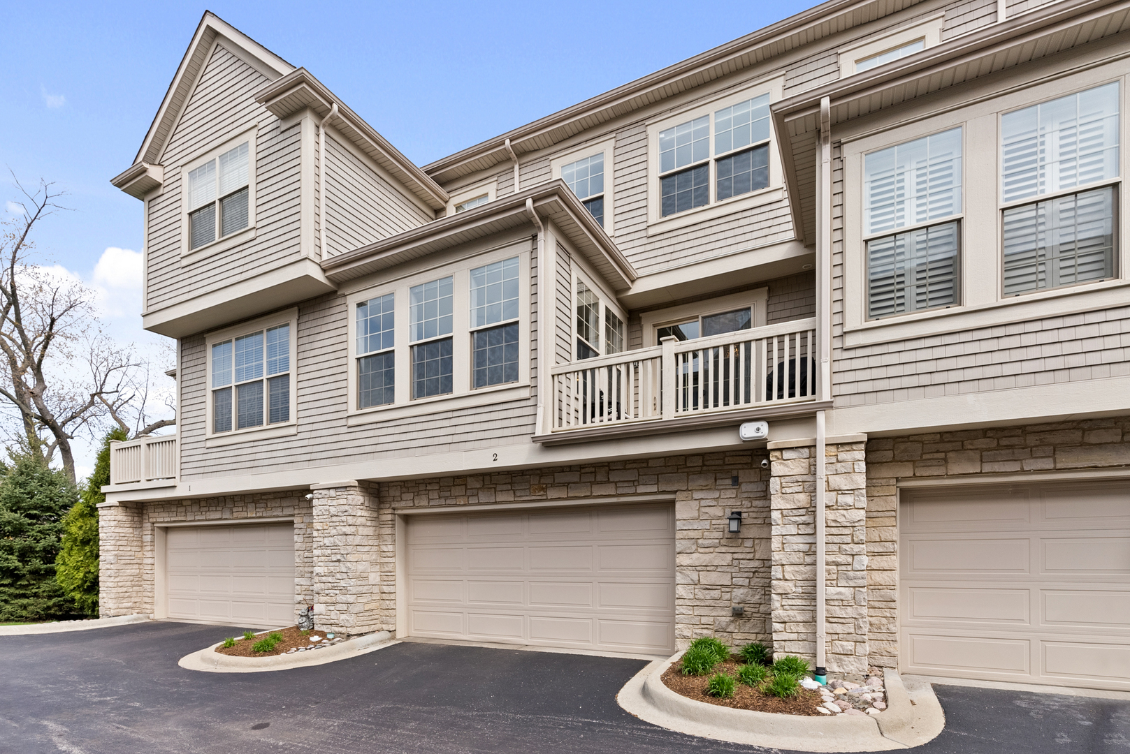 303 South NW Highway, Unit 2 Park Ridge, IL 60068 - Photo 25 of 30 a front view of a house with a yard