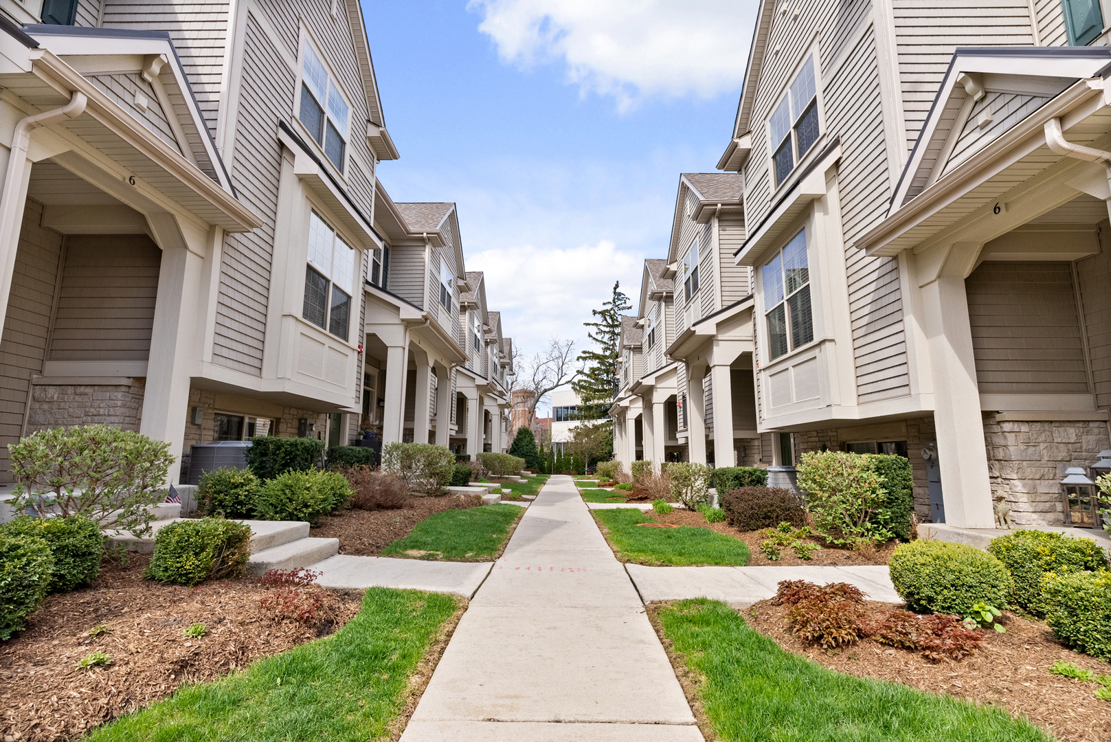 303 South NW Highway, Unit 2 Park Ridge, IL 60068 - Photo 3 of 30 a view of a building with a yard