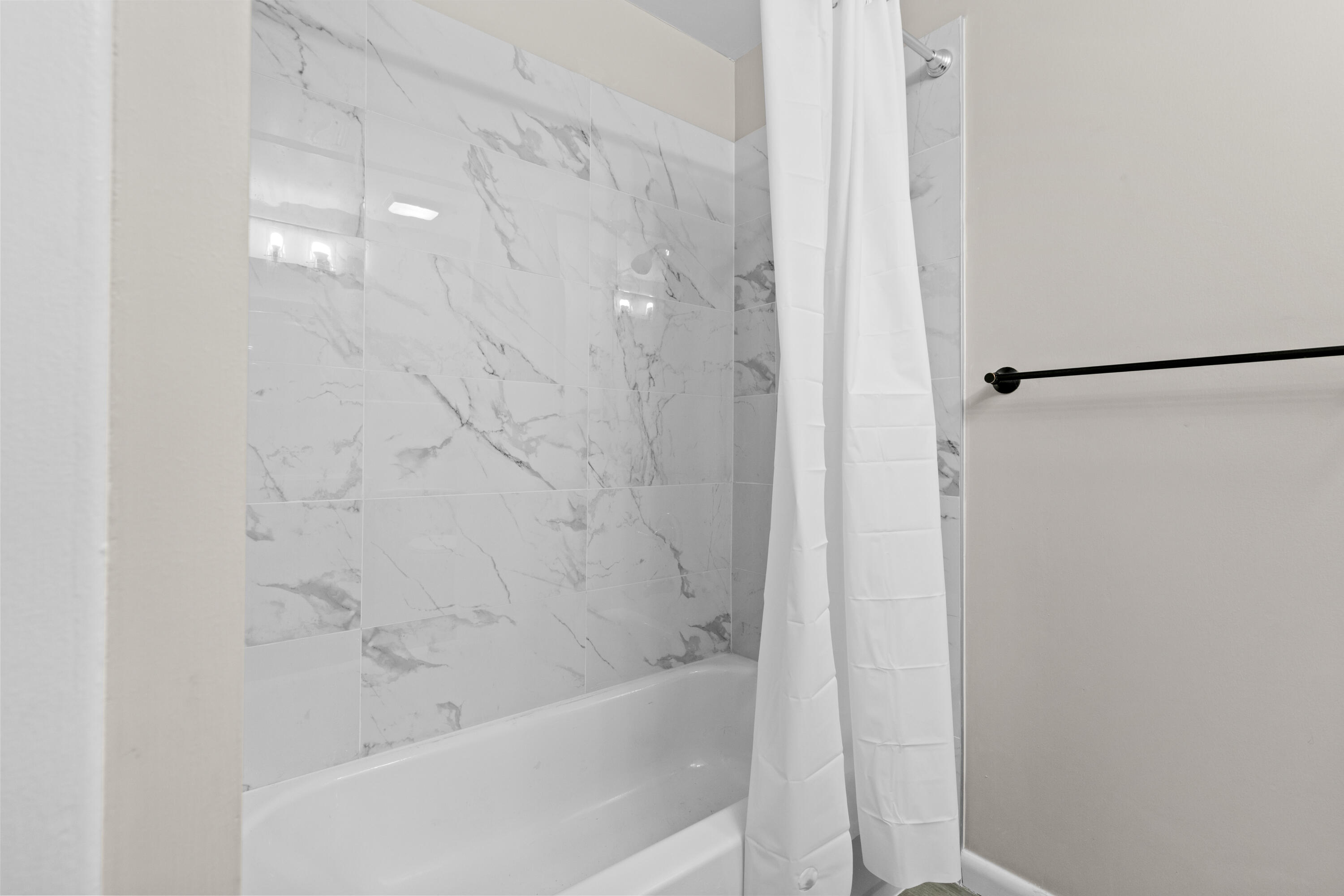 3331 Northwest 27th Avenue Gainesville, FL 32605 - Photo 21 of 29 a bathroom with a bathtub