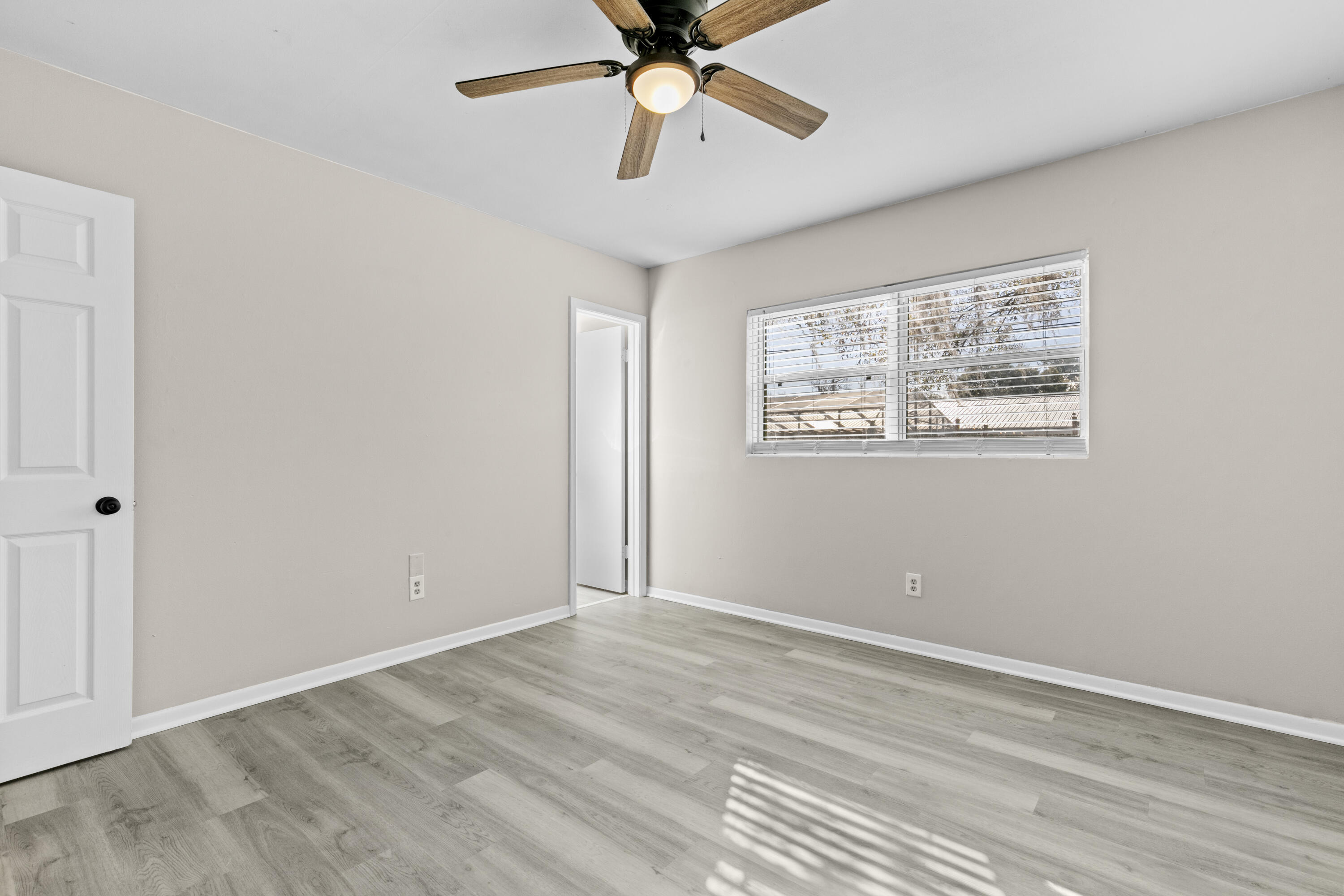 3331 Northwest 27th Avenue Gainesville, FL 32605 - Photo 25 of 29 a view of an empty room with a window