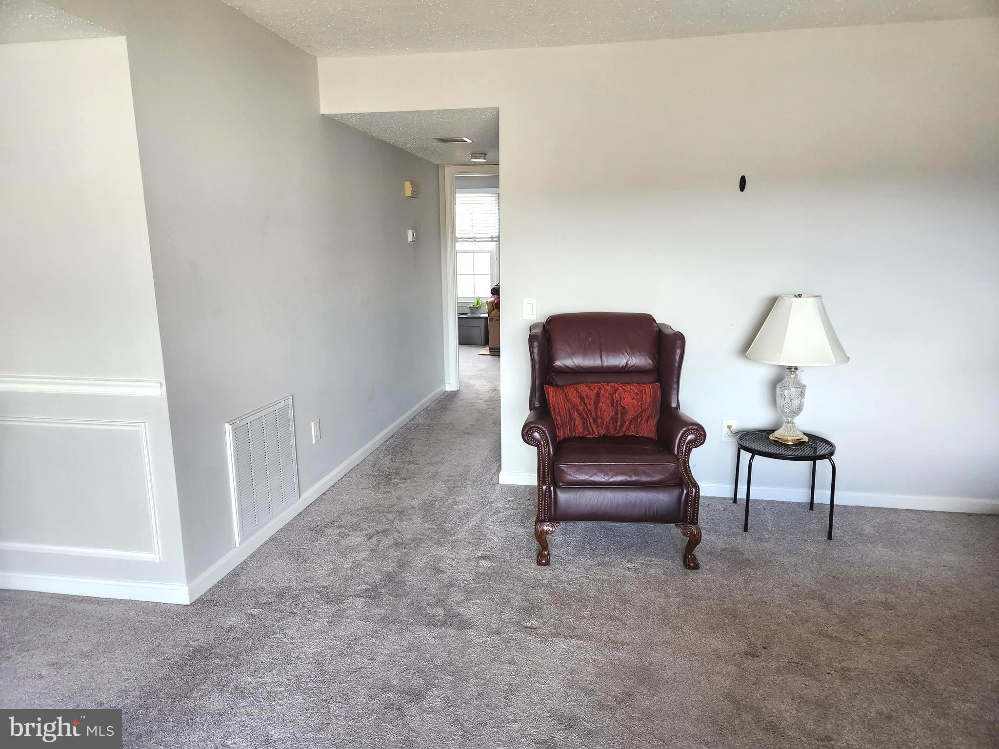 130 Fort Evans Road Southeast, Unit D Leesburg, VA 20175 - Photo 5 of 13 Living Room looking towards Bedrooms