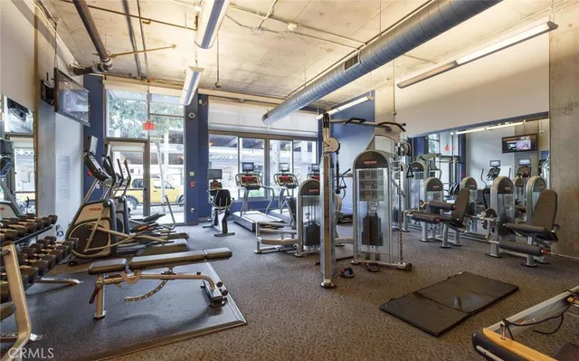 a view of parking space with parked cars