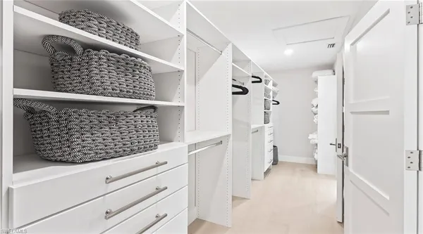 a view of a kitchen with sink washer and dryer