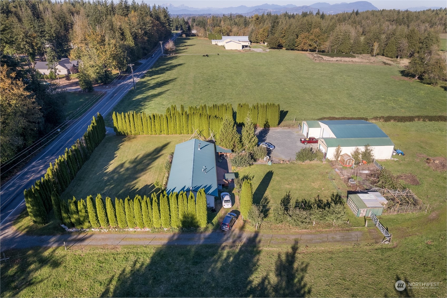 8170 North Telegraph Road Everson, WA 98247 - Photo 2 of 40 an aerial view of a house with a lake view