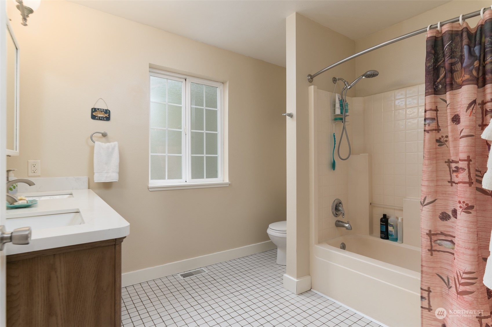 8170 North Telegraph Road Everson, WA 98247 - Photo 21 of 40 a bathroom with a bathtub a sink a toilet and a shower