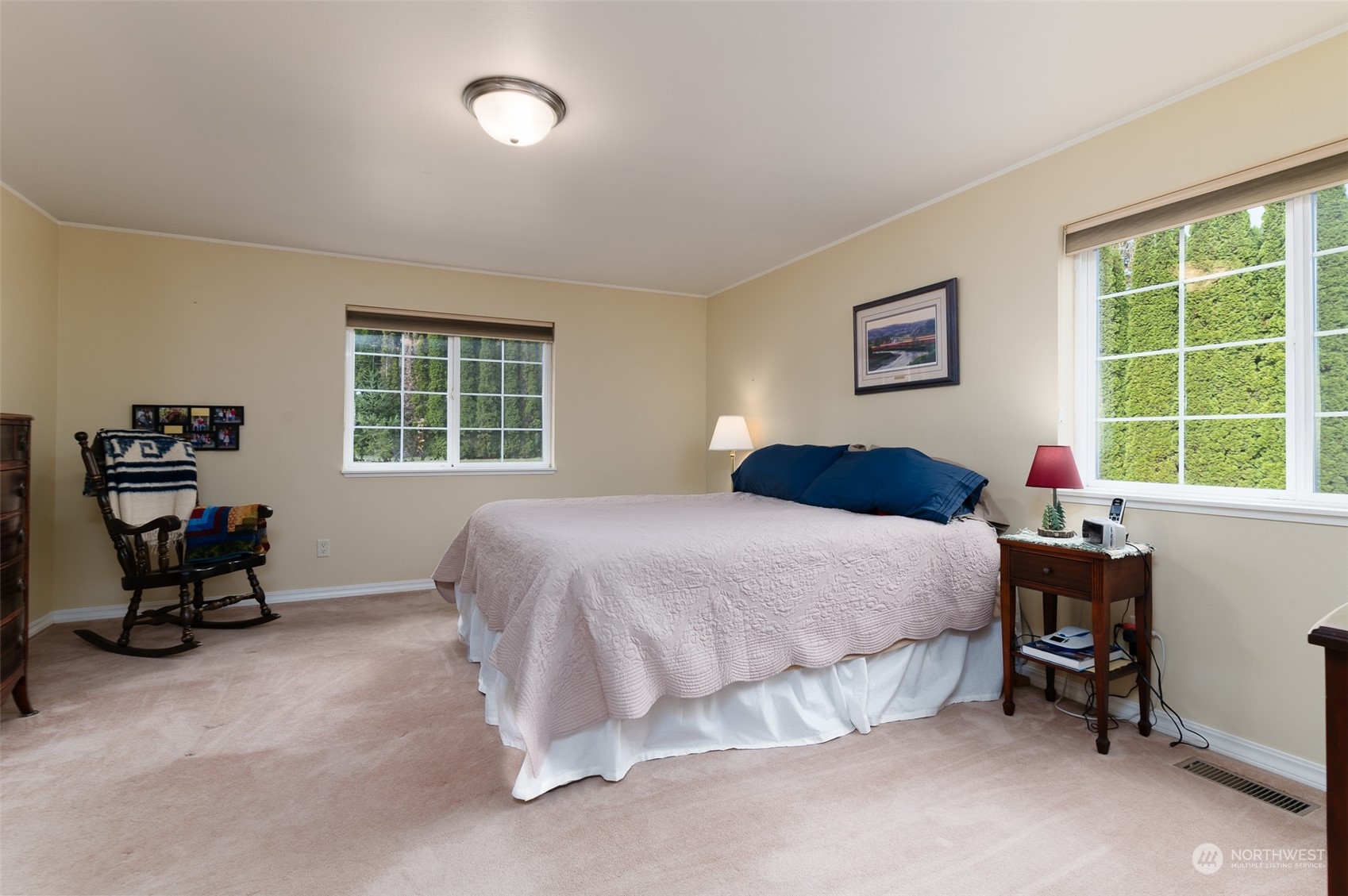 8170 North Telegraph Road Everson, WA 98247 - Photo 23 of 40 a bedroom with a bed and a chair