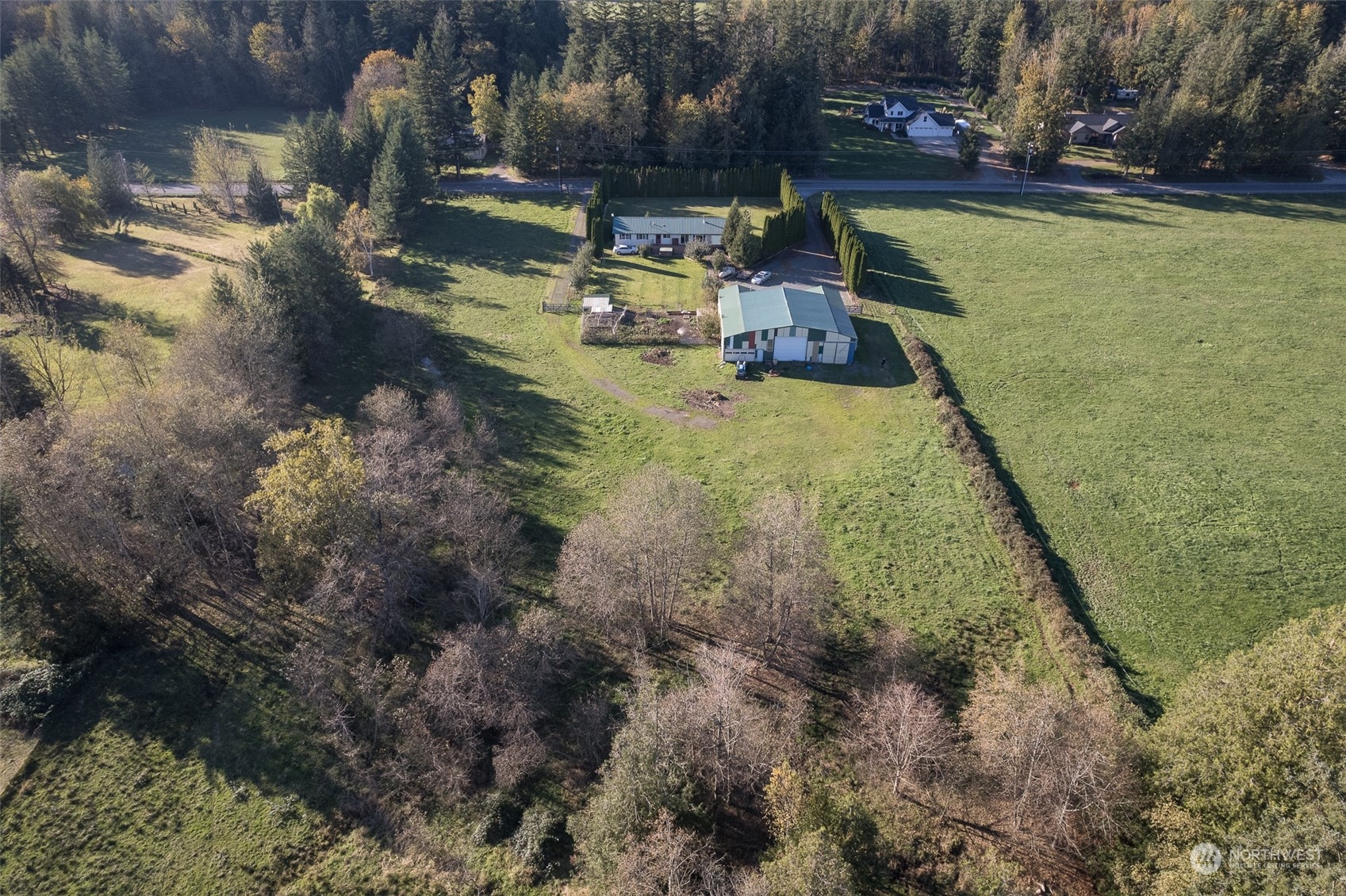 8170 North Telegraph Road Everson, WA 98247 - Photo 3 of 40 a view of a yard with chairs