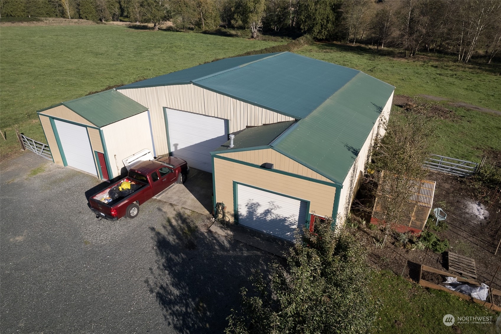 8170 North Telegraph Road Everson, WA 98247 - Photo 38 of 40 an aerial view of a house with outdoor space swimming pool and outdoor seating