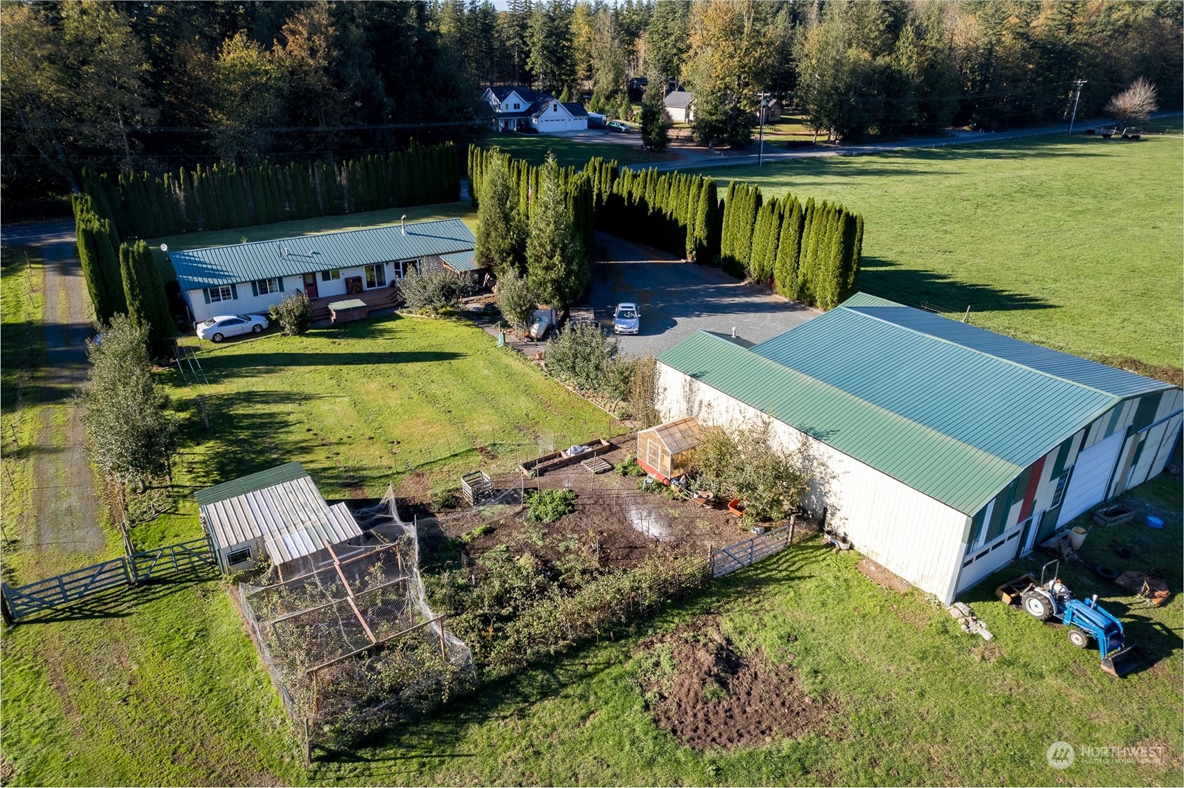 8170 North Telegraph Road Everson, WA 98247 - Photo 40 of 40 an aerial view of a house with swimming pool garden and patio