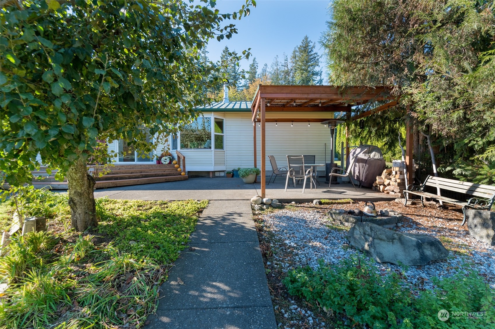 8170 North Telegraph Road Everson, WA 98247 - Photo 7 of 40 a view of a house with backyard and sitting area