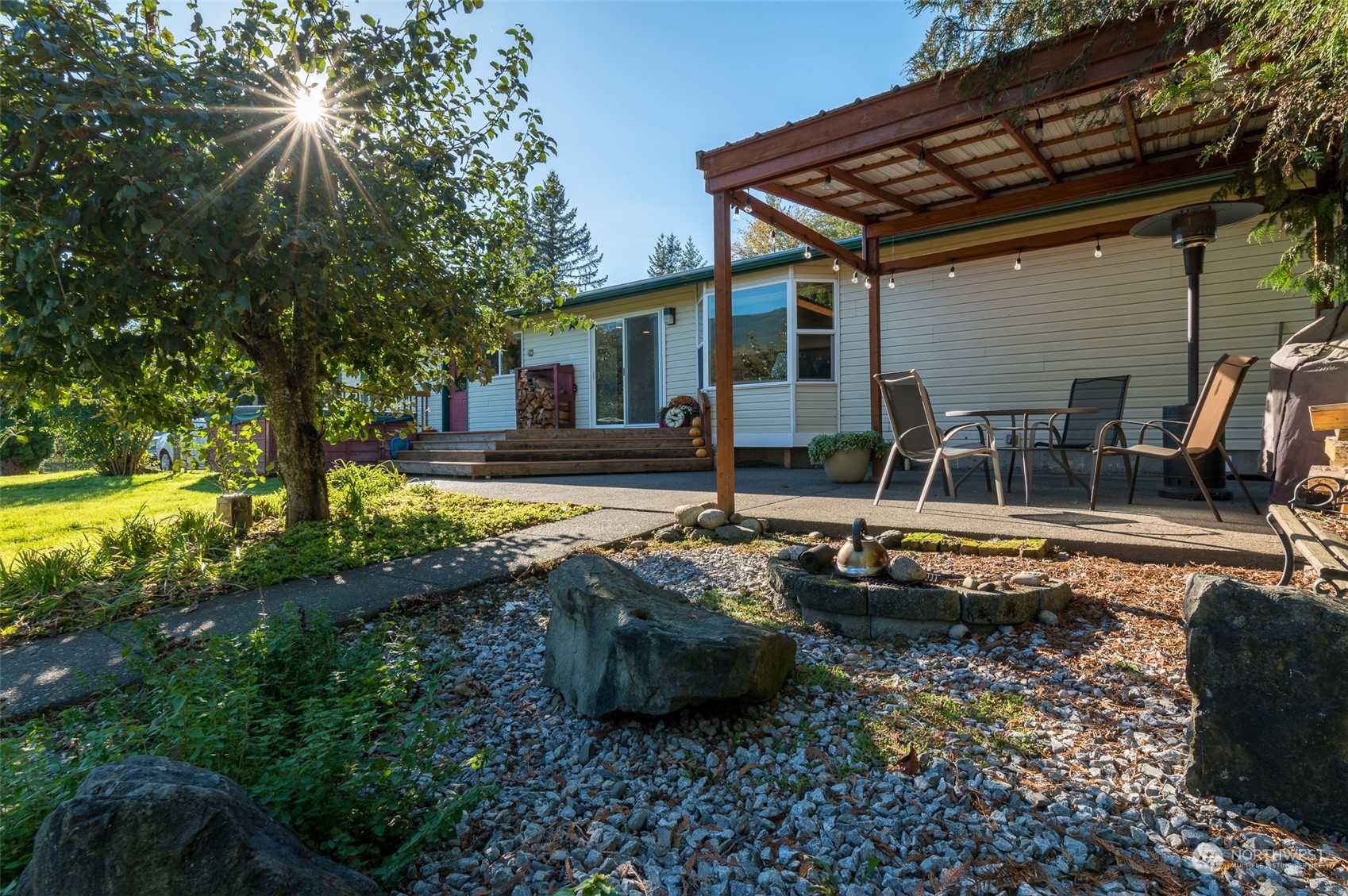 8170 North Telegraph Road Everson, WA 98247 - Photo 8 of 40 a view of a house with backyard and sitting area