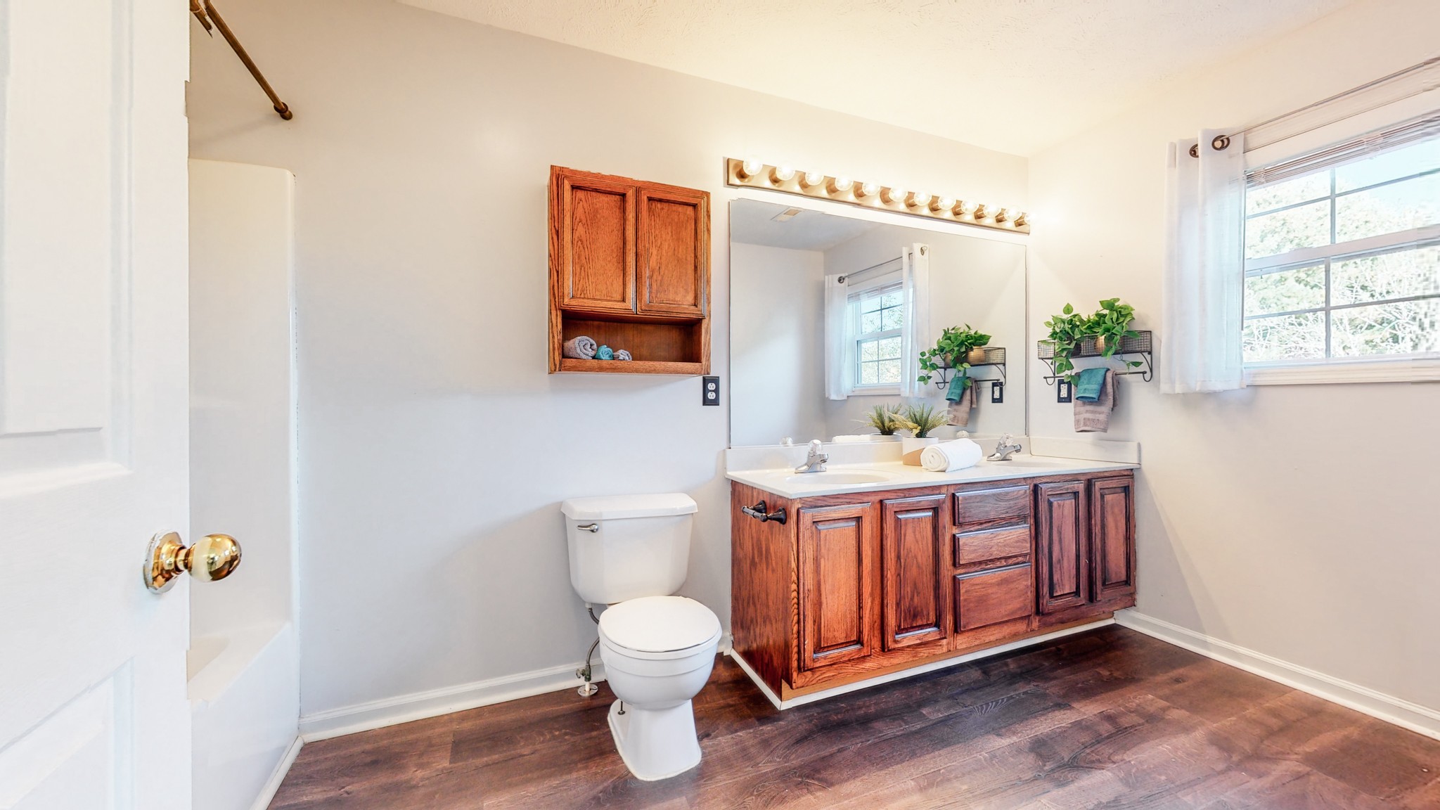 2114 Clara Mathis Road Spring Hill, TN 37174 - Photo 24 of 62 a bathroom with a sink mirror and a toilet