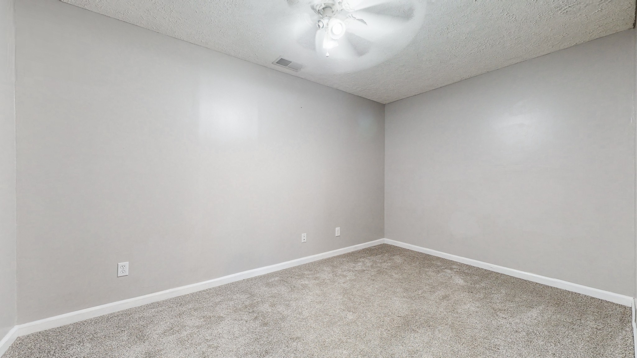 2114 Clara Mathis Road Spring Hill, TN 37174 - Photo 35 of 62 an empty room with a ceiling fan and window