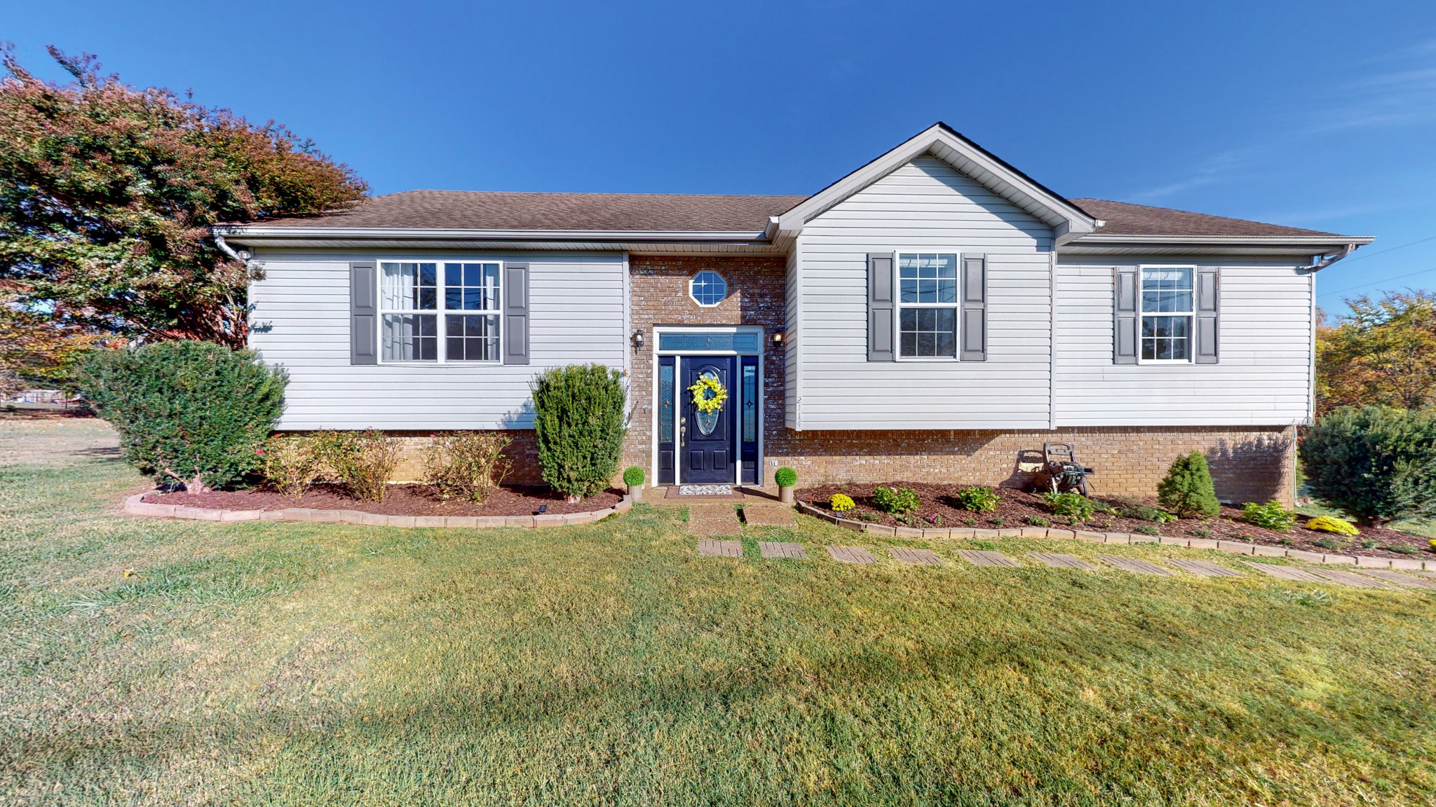 2114 Clara Mathis Road Spring Hill, TN 37174 - Photo 41 of 62 a front view of a house with a yard
