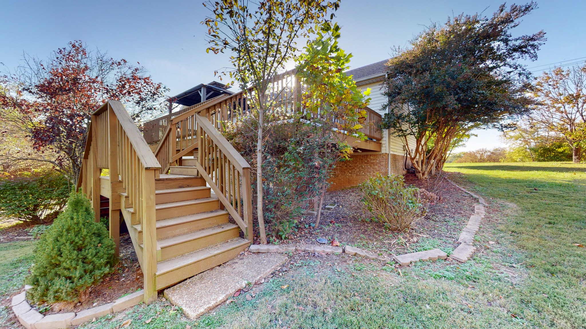 2114 Clara Mathis Road Spring Hill, TN 37174 - Photo 46 of 62 a view of a yard with plants and a large tree