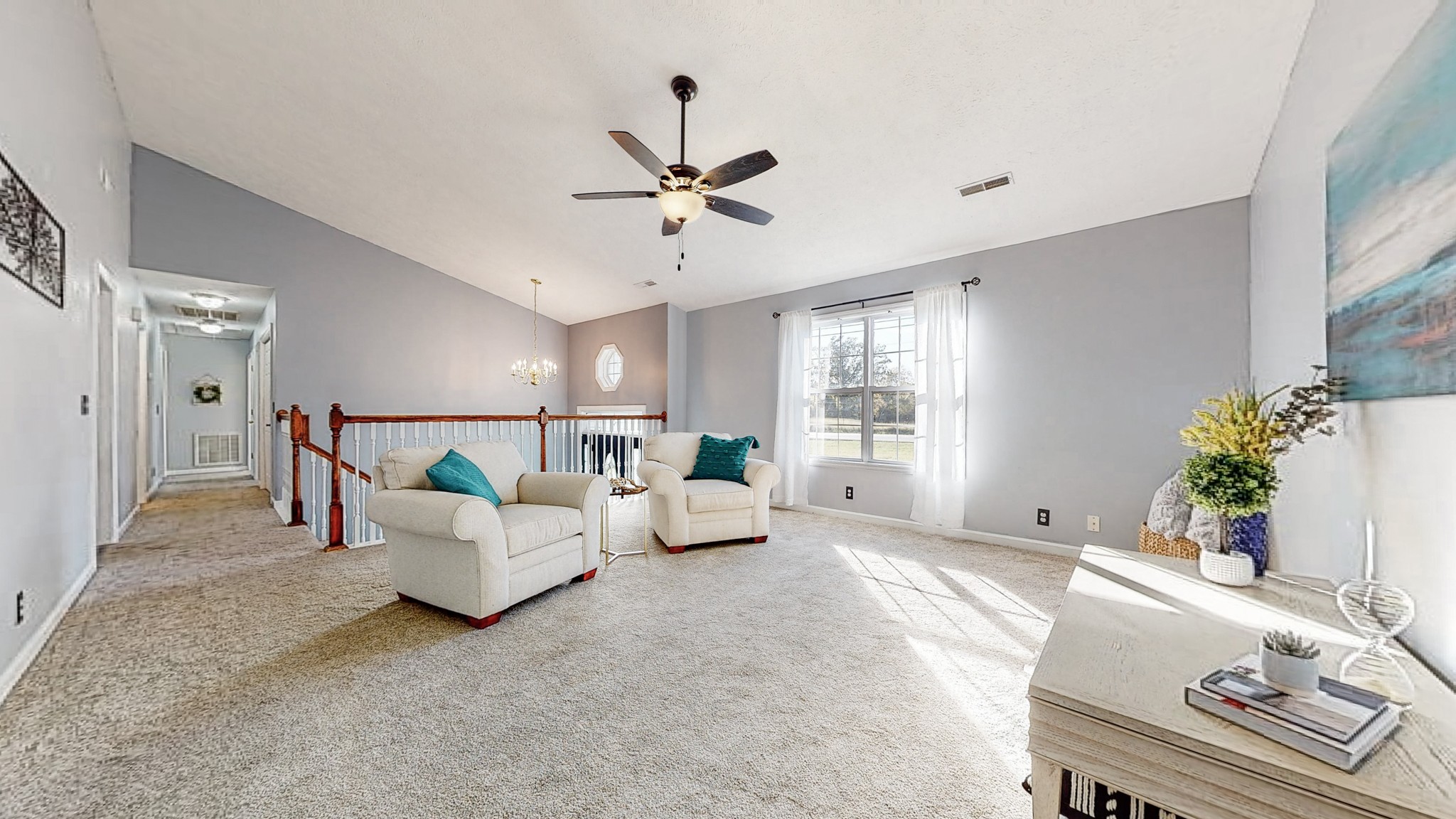 2114 Clara Mathis Road Spring Hill, TN 37174 - Photo 5 of 62 a living room with furniture and a chandelier