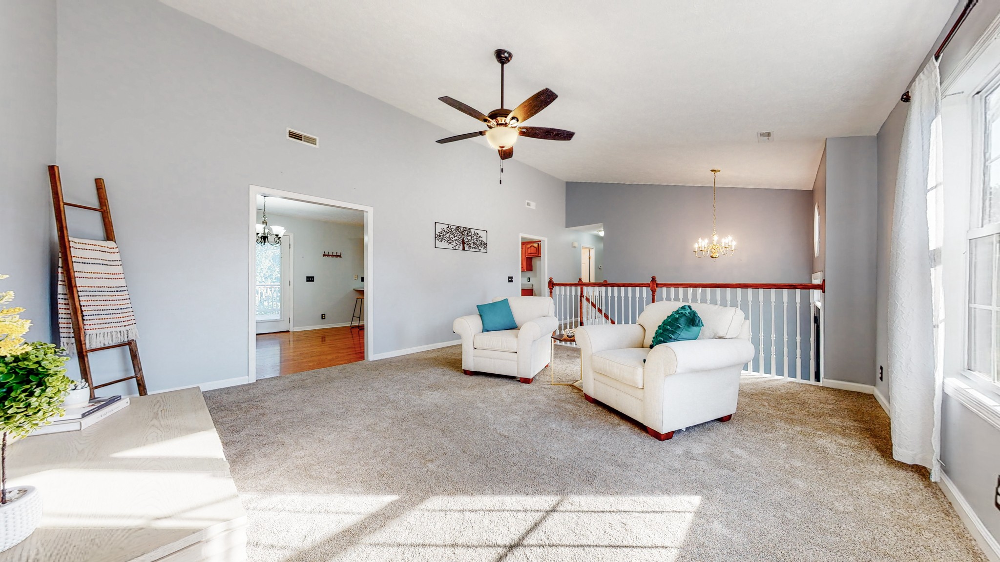 2114 Clara Mathis Road Spring Hill, TN 37174 - Photo 6 of 62 a living room with furniture and a chandelier