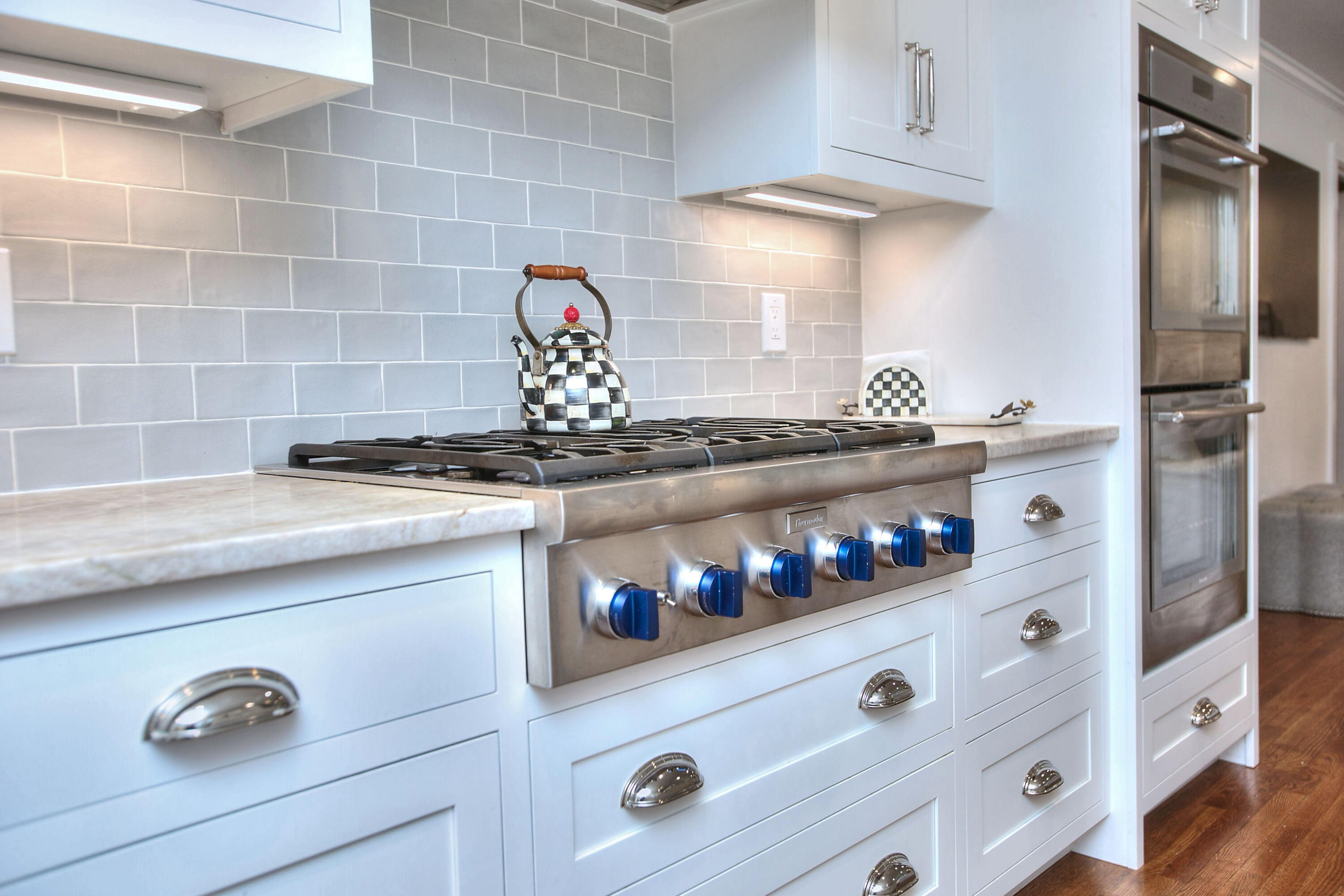 45 Beech Road New Canaan, CT 06840 - Photo 11 of 37 a kitchen with stainless steel appliances granite countertop a sink and cabinets