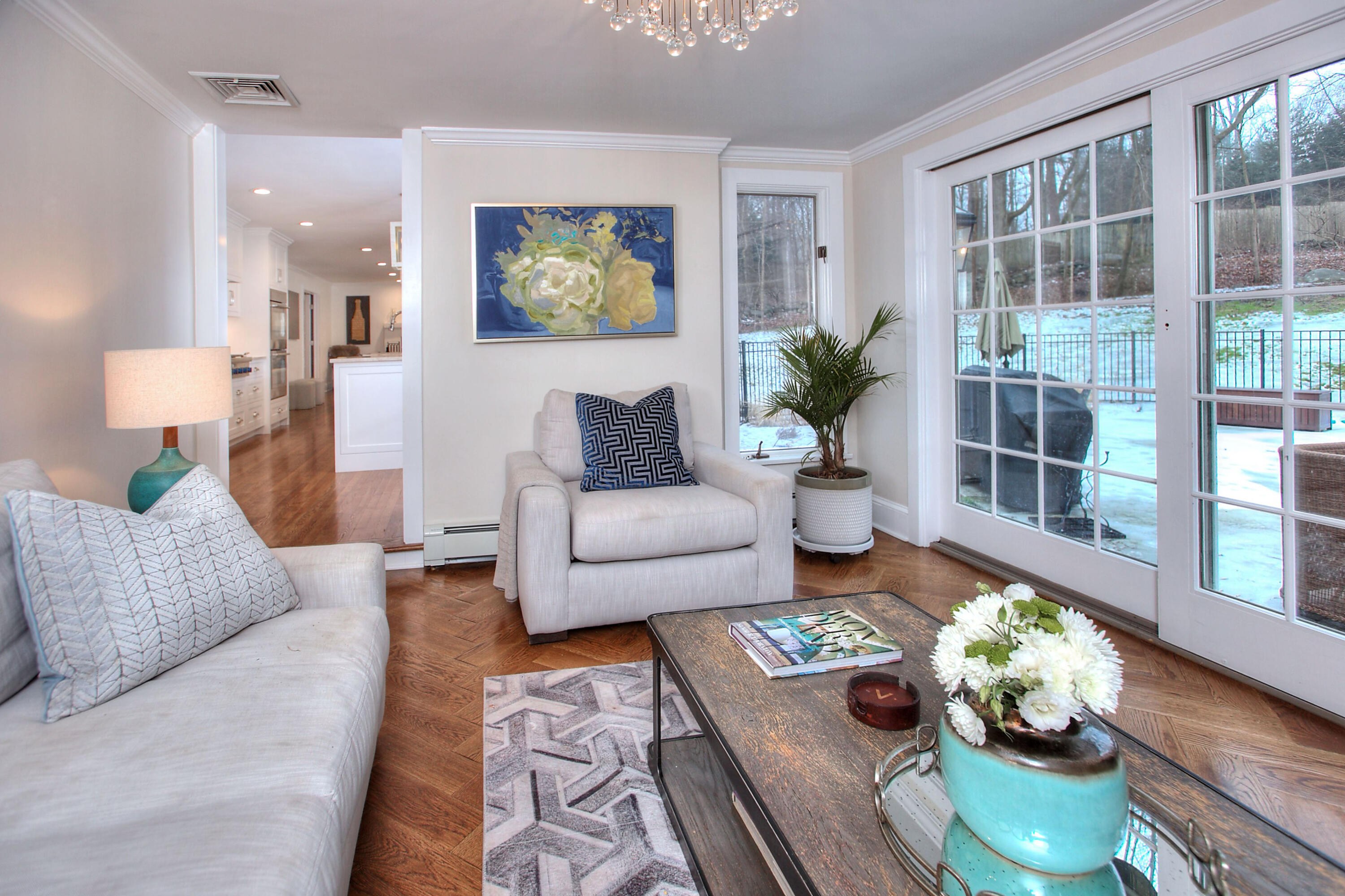 45 Beech Road New Canaan, CT 06840 - Photo 16 of 37 a living room with furniture and a potted plant