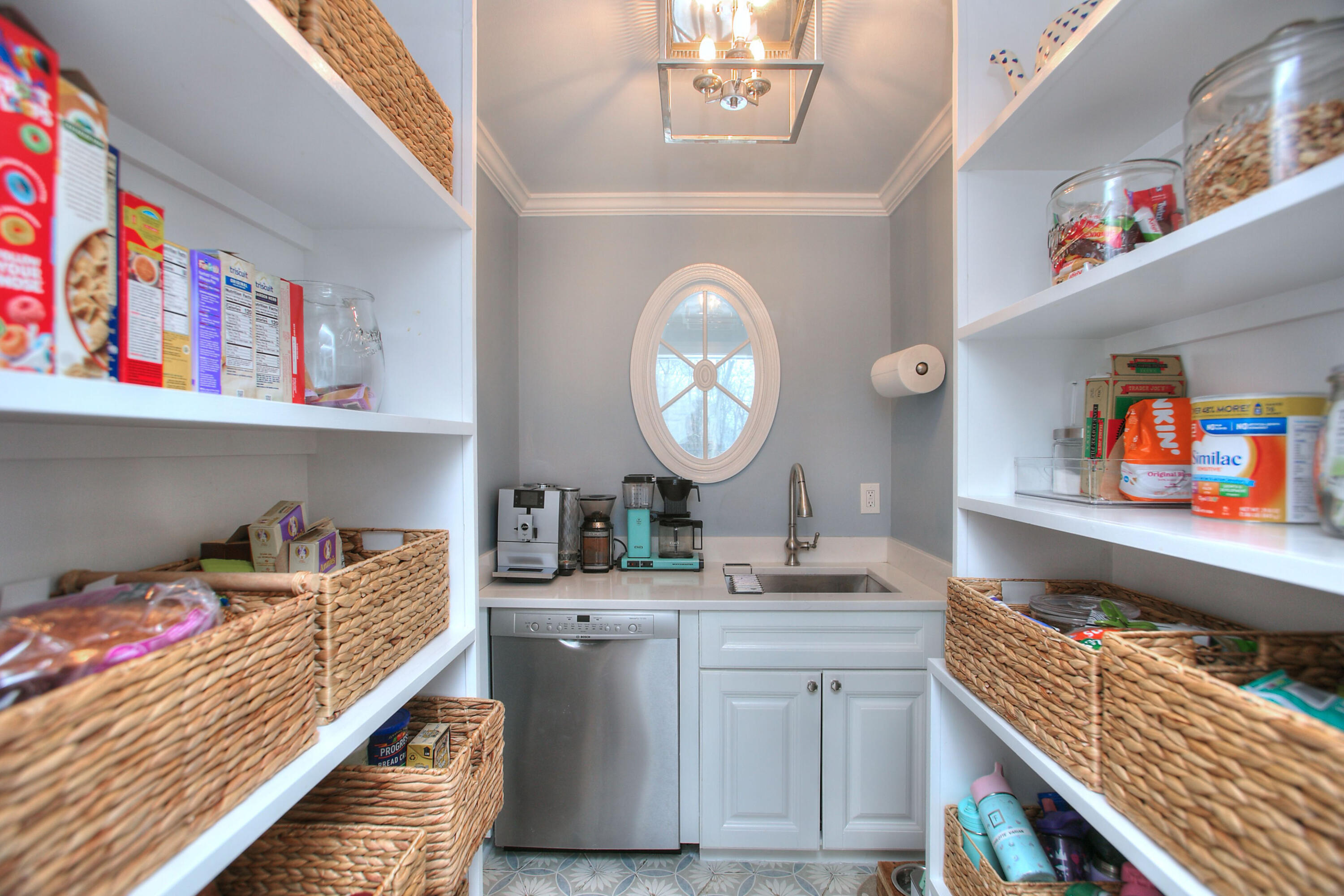45 Beech Road New Canaan, CT 06840 - Photo 19 of 37 a kitchen with a sink and cabinets