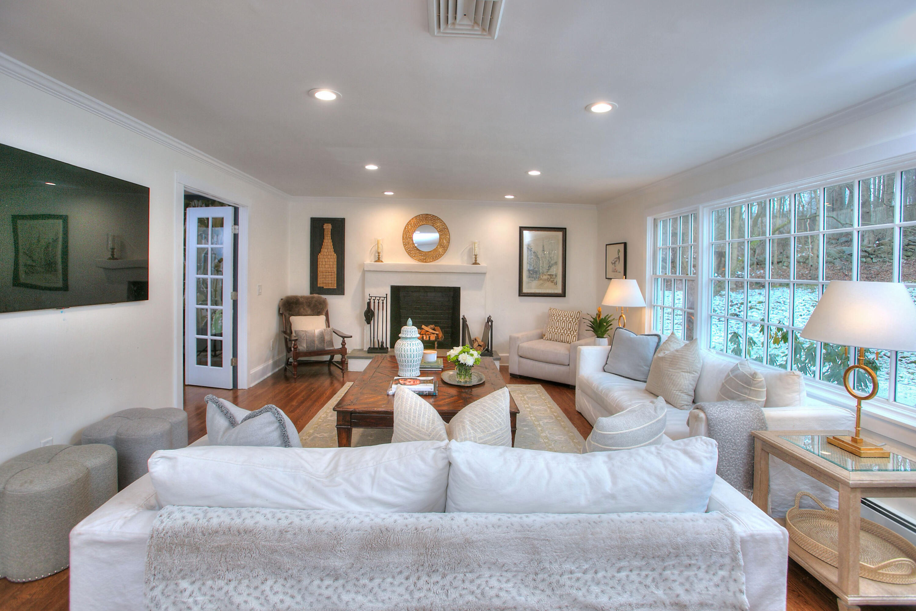 45 Beech Road New Canaan, CT 06840 - Photo 6 of 37 a living room with furniture and a large window