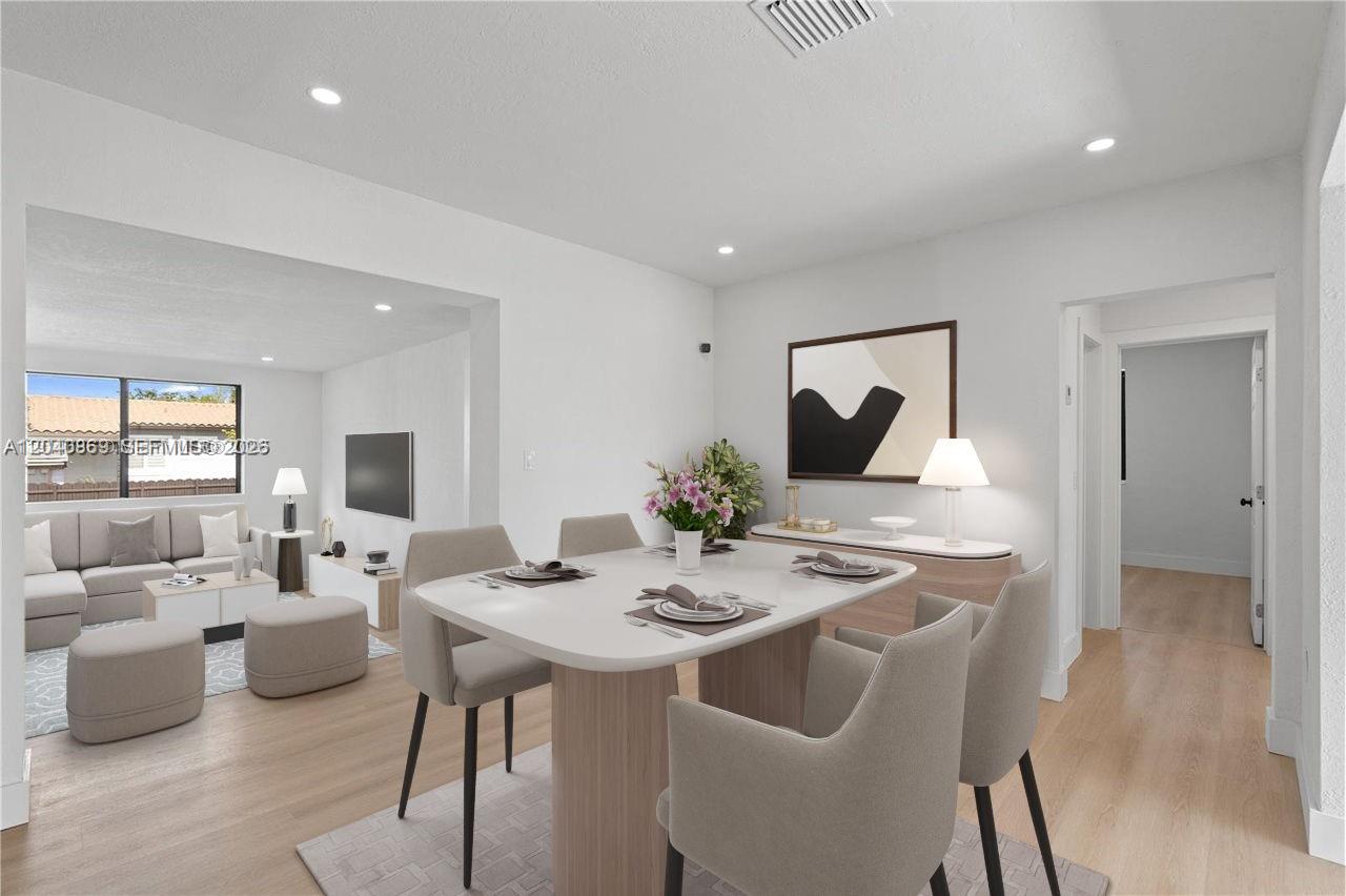 31 West 64th Street Hialeah, FL 33012 - Photo 16 of 49 a view of a dining room with furniture