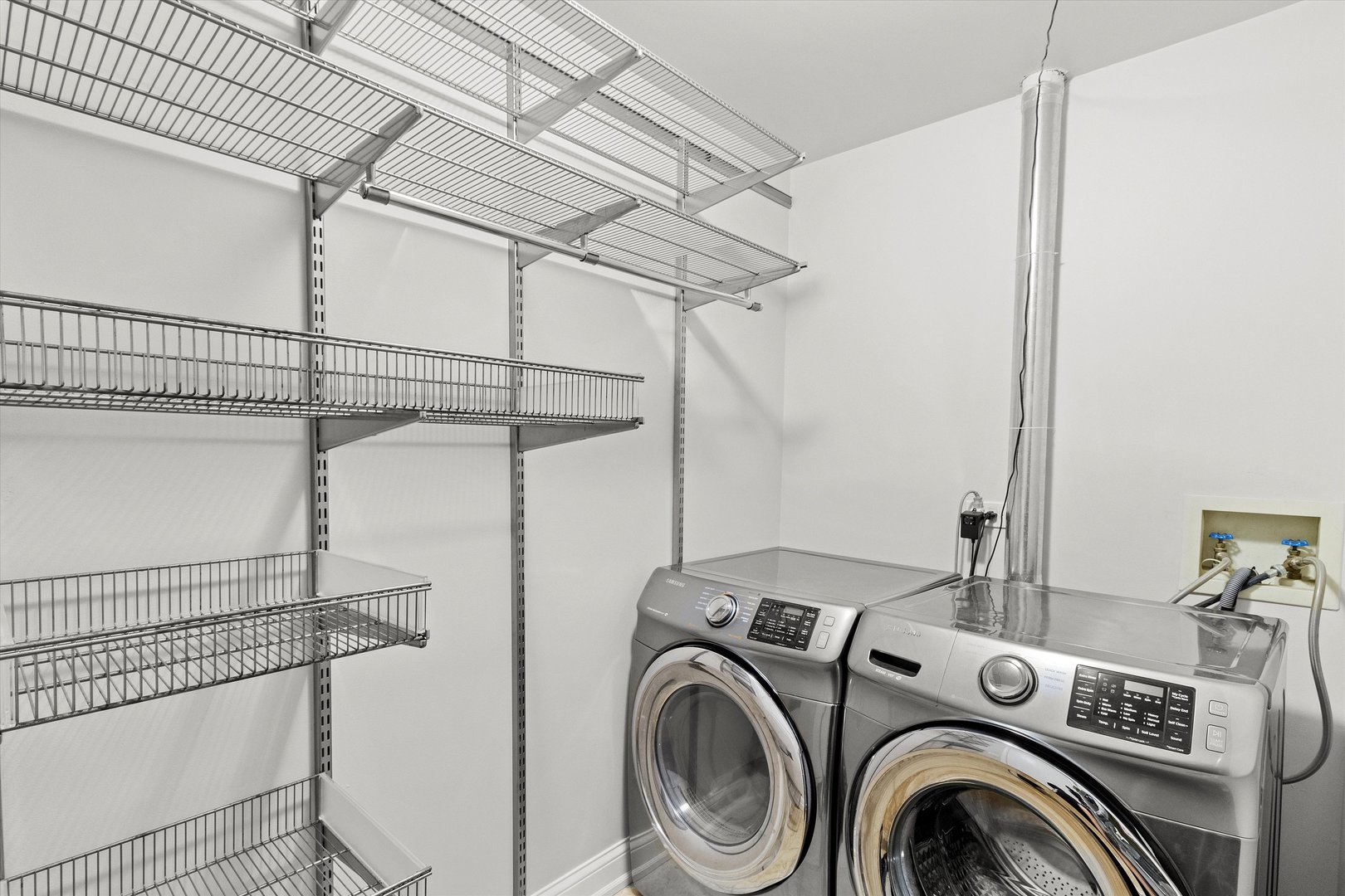 1615 West Hawkes Street, Unit 5 Arlington Heights, IL 60004 - Photo 15 of 17 a utility room with dryer and washer