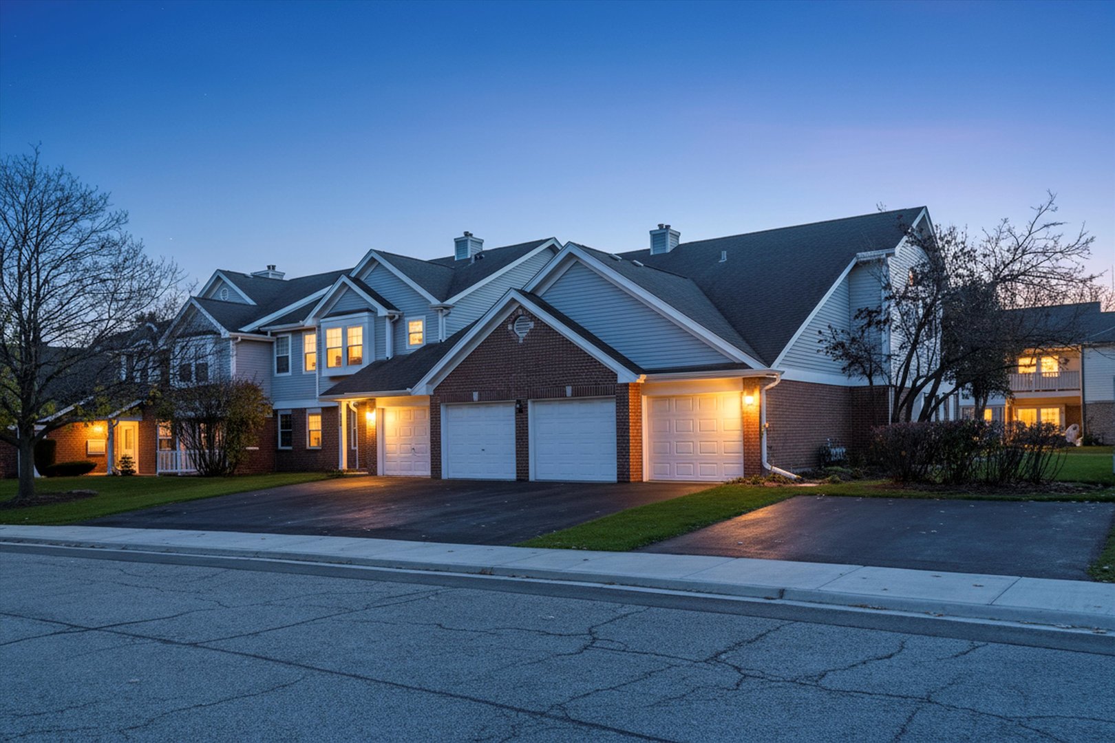 1615 West Hawkes Street, Unit 5 Arlington Heights, IL 60004 - Photo 2 of 17 a front view of house along with street